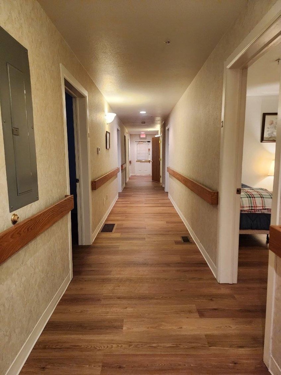 Residents enjoying the hallway at Your Home Wiggins